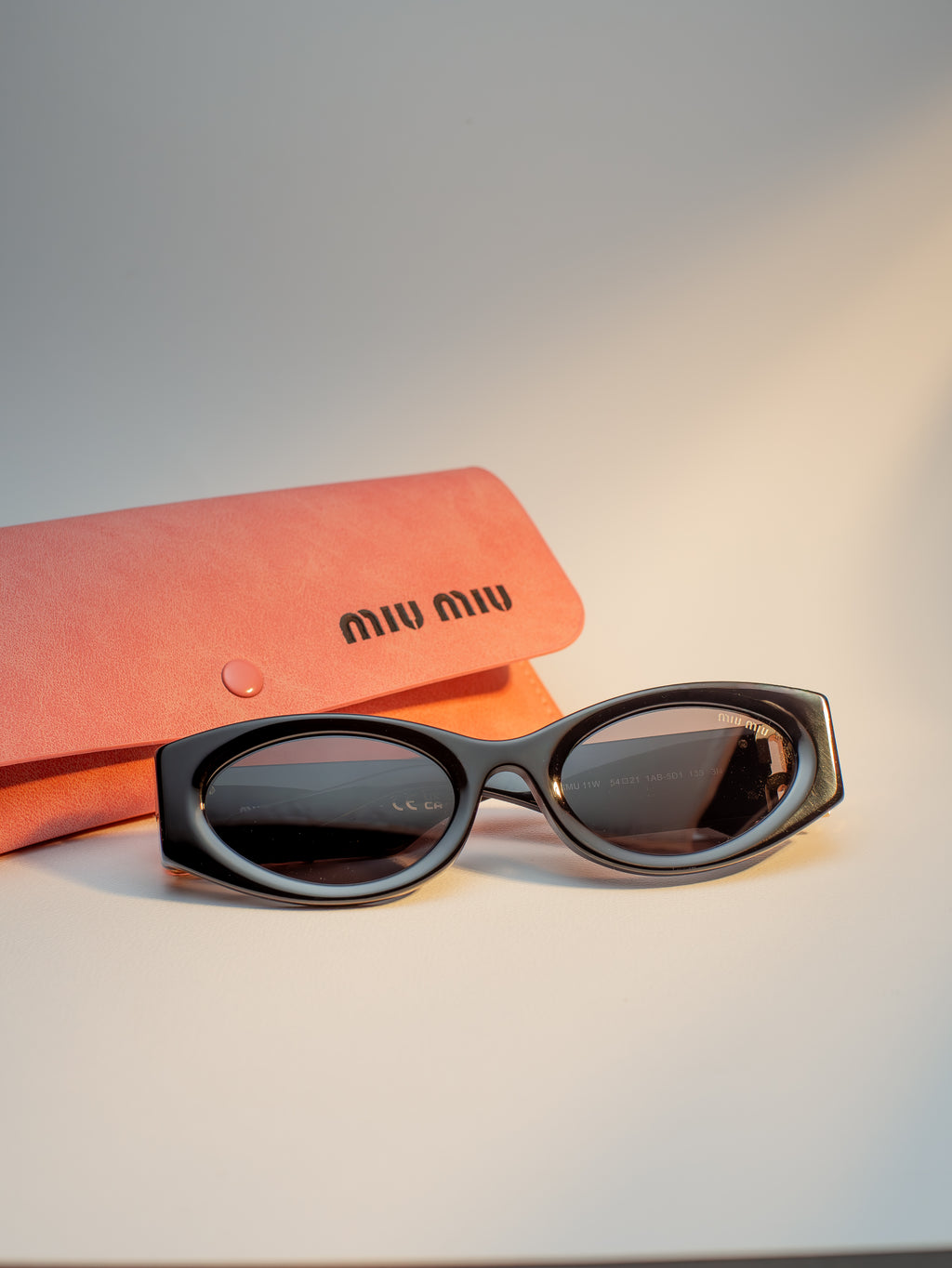 MIU MIU SMU 11W