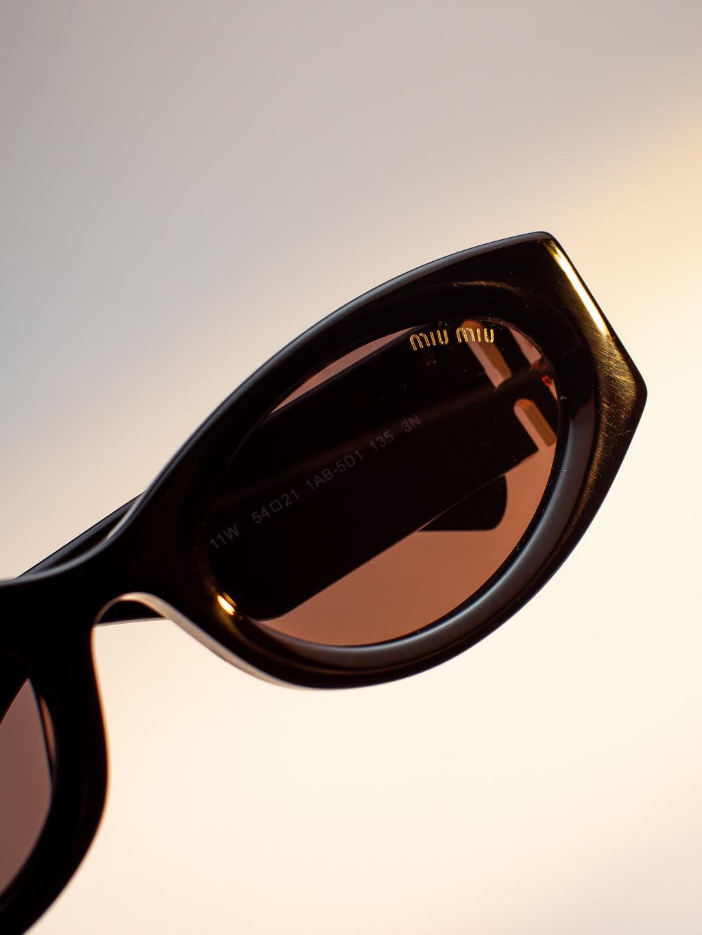 MIU MIU SMU 11W